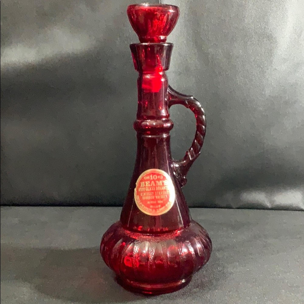 Vintage ruby red Jim Beam Genie decanter.